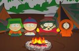 Cartman, Stan, Kenny, and Kyle around a campfire.